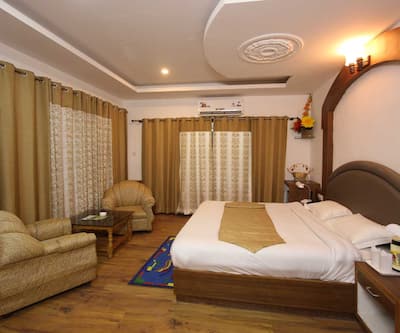 https://imgcld.yatra.com/ytimages/image/upload/t_hotel_yatra_city_desktop/v1494850494/Hotel/Manali/00041805 /8_BU2gNO.jpg